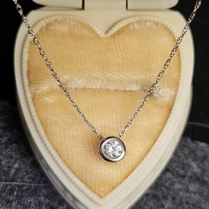 14k genuine diamond necklace 10k chain measures about 19  inches. Pendant stampe